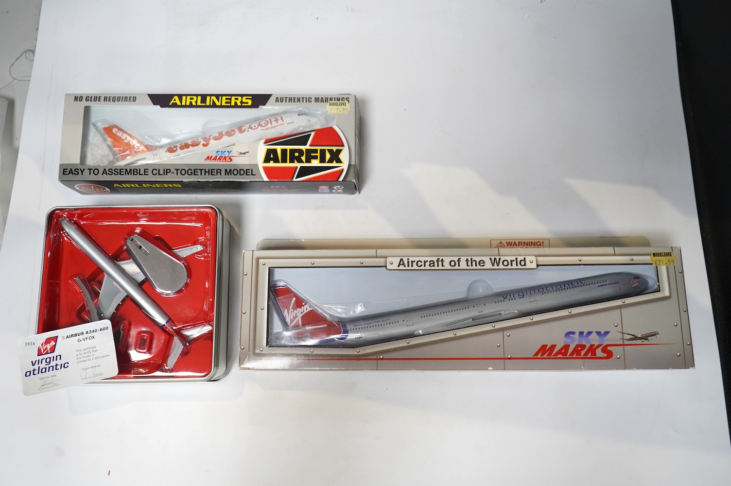 Forty-four boxed models of modern passenger aircraft by Gemini Jets, Airfix, Sky Marks, etc. in a variety of scales including 1:400, 1:200, etc. operators include British Airways, Vietnam Airlines, Virgin Atlantic, etc.